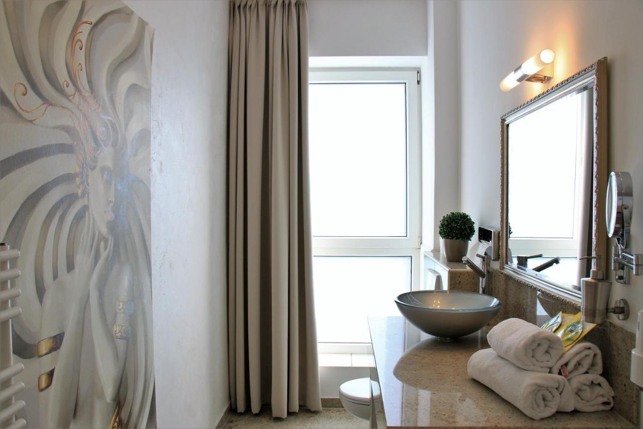 Aparthotel Scheuer เฮิร์ท ภายนอก รูปภาพ